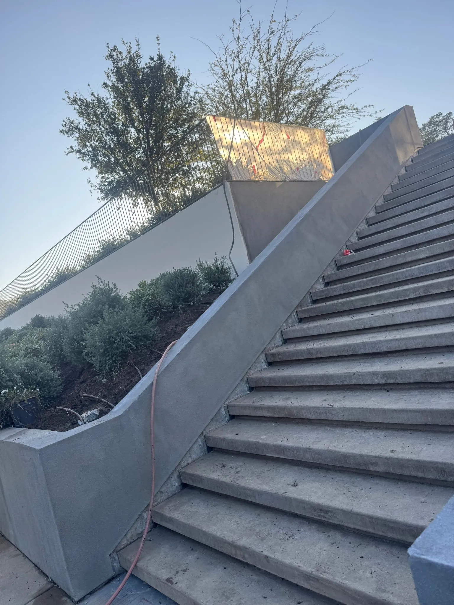 One Stop Plastering retaining wall and hardscape work.